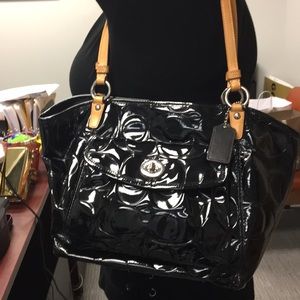 Chic black Coach shoulder bag.